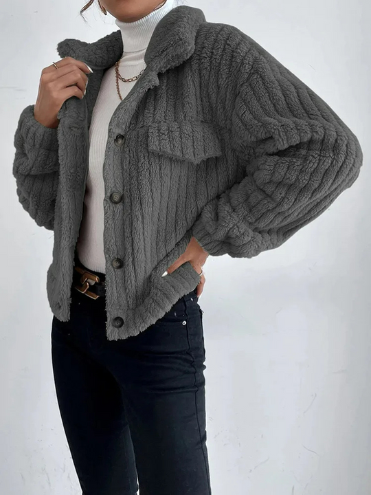 Short women's faux fur jacket for spring