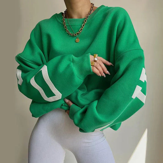 Oversized, trendy jumper with letters on the sleeves for women